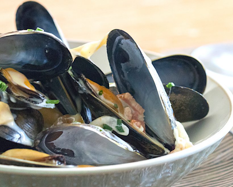 The Inn at St. Peters, St. Peters Bay Locals and in-the-know visitors make sure to come for lunch Wednesday through Sunday, so they can order the local PEI mussels. The bivalves are served in a white wine and garlic sauce. Why mess with a good thing? Diners also know that the St. Peters Bay views from the expansive windows make it hard to leave at the end of the meal — kinda like pulling mussels from the shell. Make a reservation at The Inn at St. Peters.