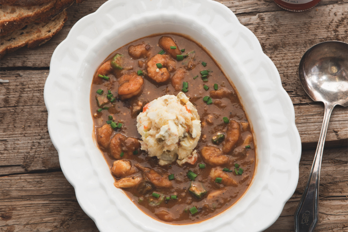 Seafood gumbo in a white bowl