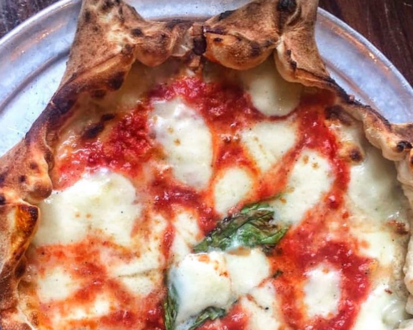 A star-shaped margherita pizza