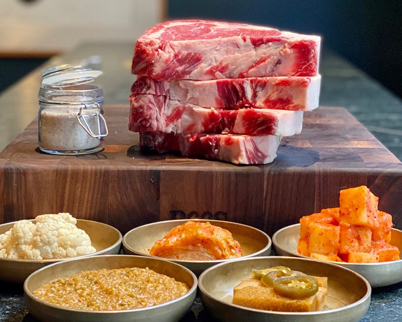 Raw steak and Korean sides