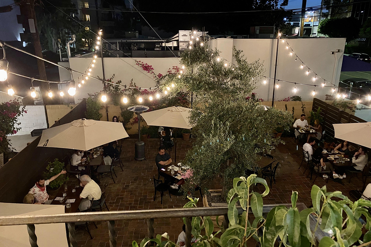 An outdoor patio with string lights