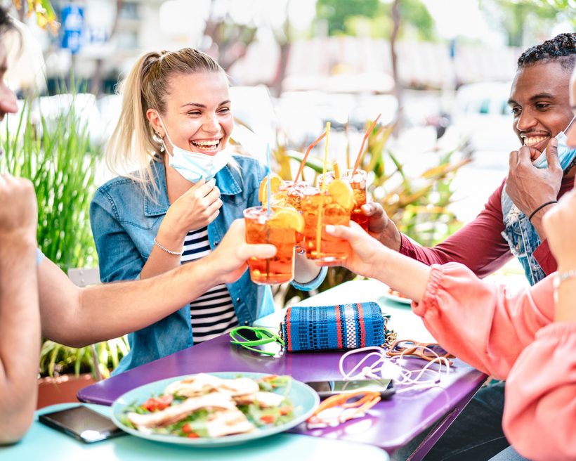 Friends cheersing at a restaurant