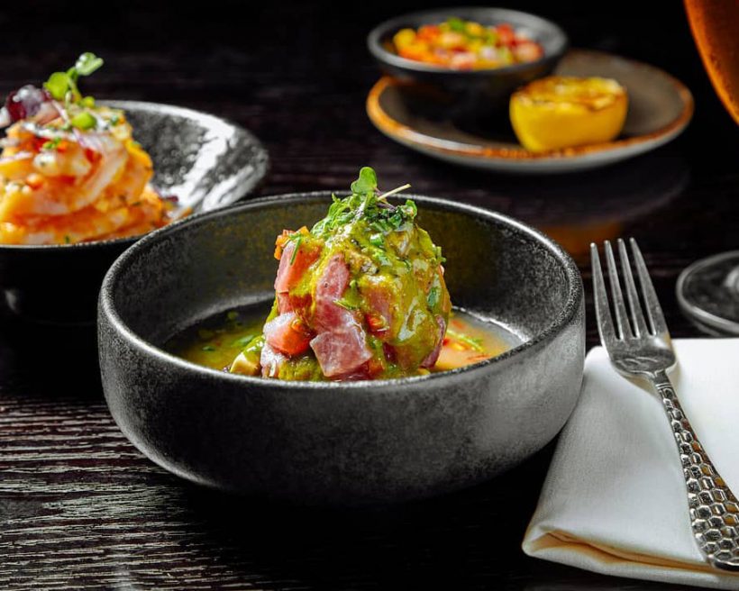 A bowl of ceviche on a table