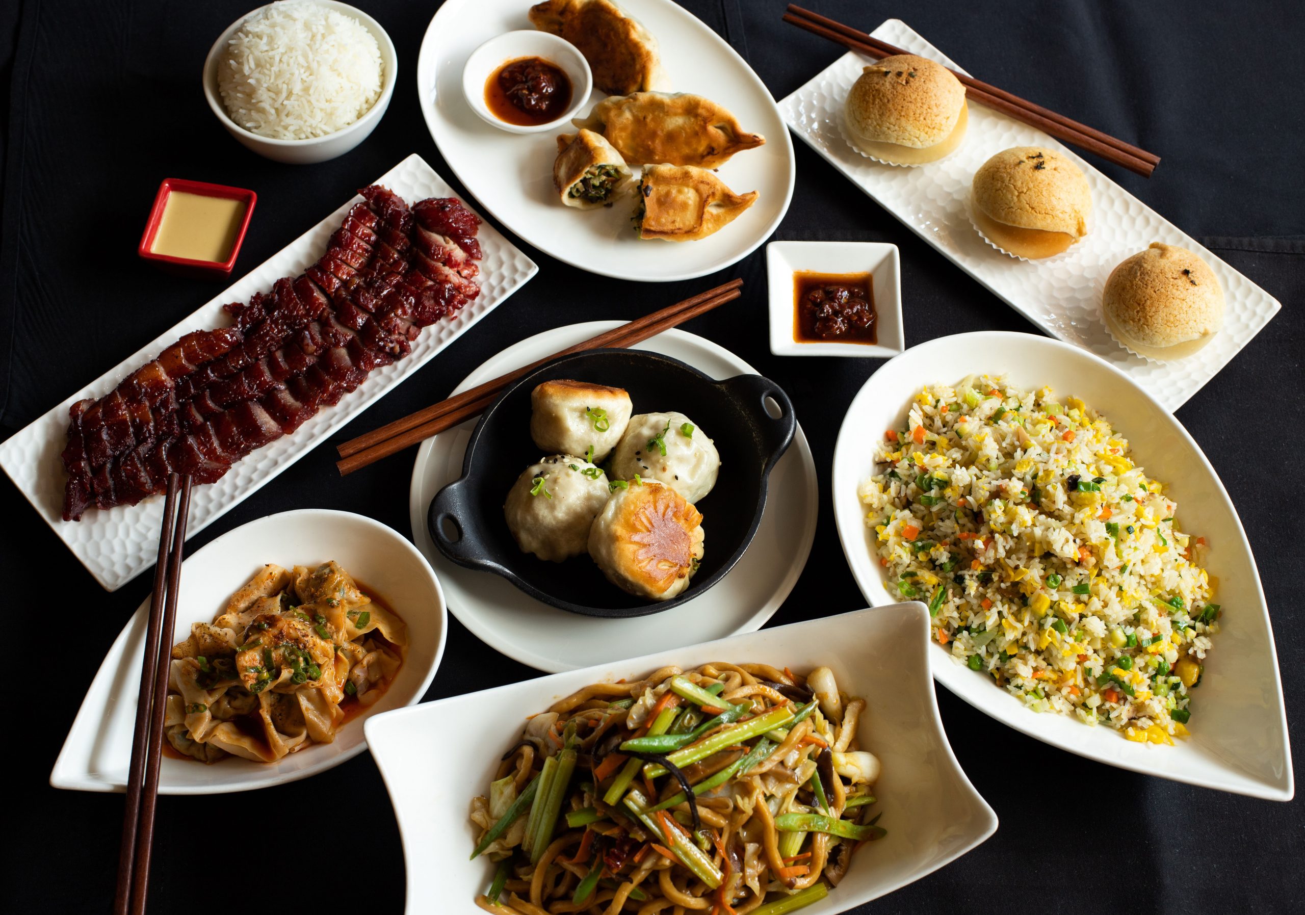 An assortment of Chinese dishes on a table.