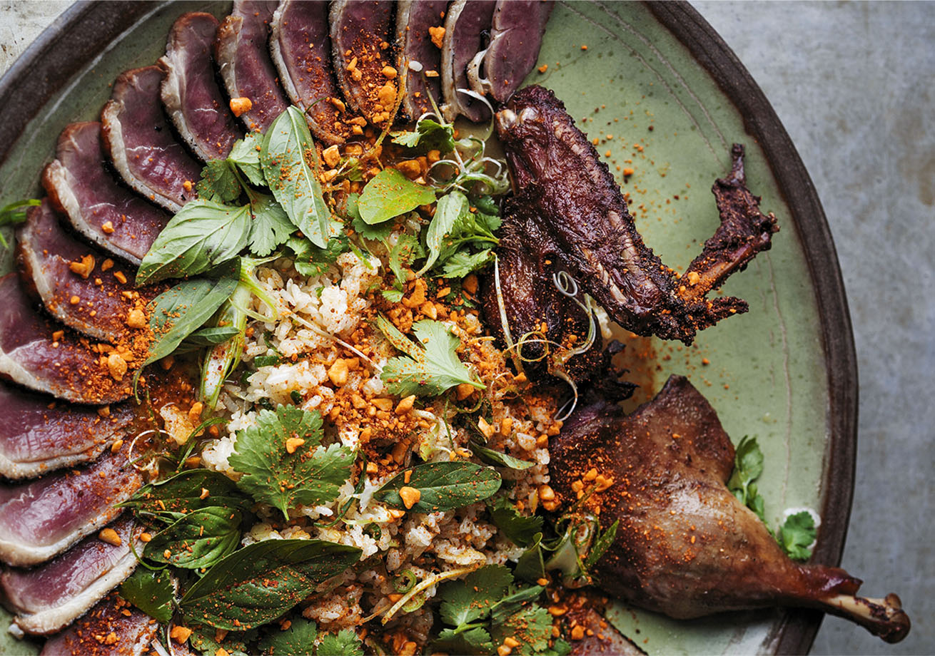 A platter of carved roasted duck.