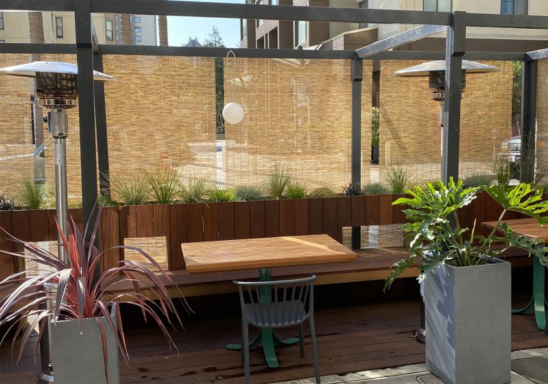 Outdoor tables with heaters