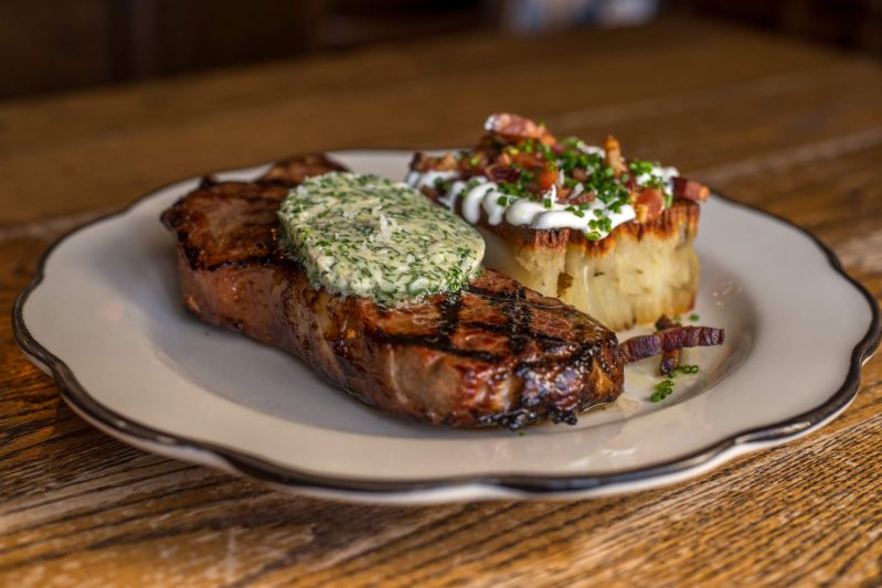 ny-strip-herb-butter-potato-pave-sour-cream-bacon-chive