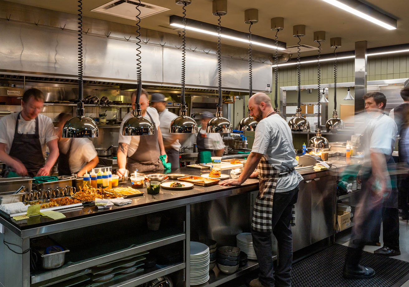 Chefs at work inside Canoe's kitchen