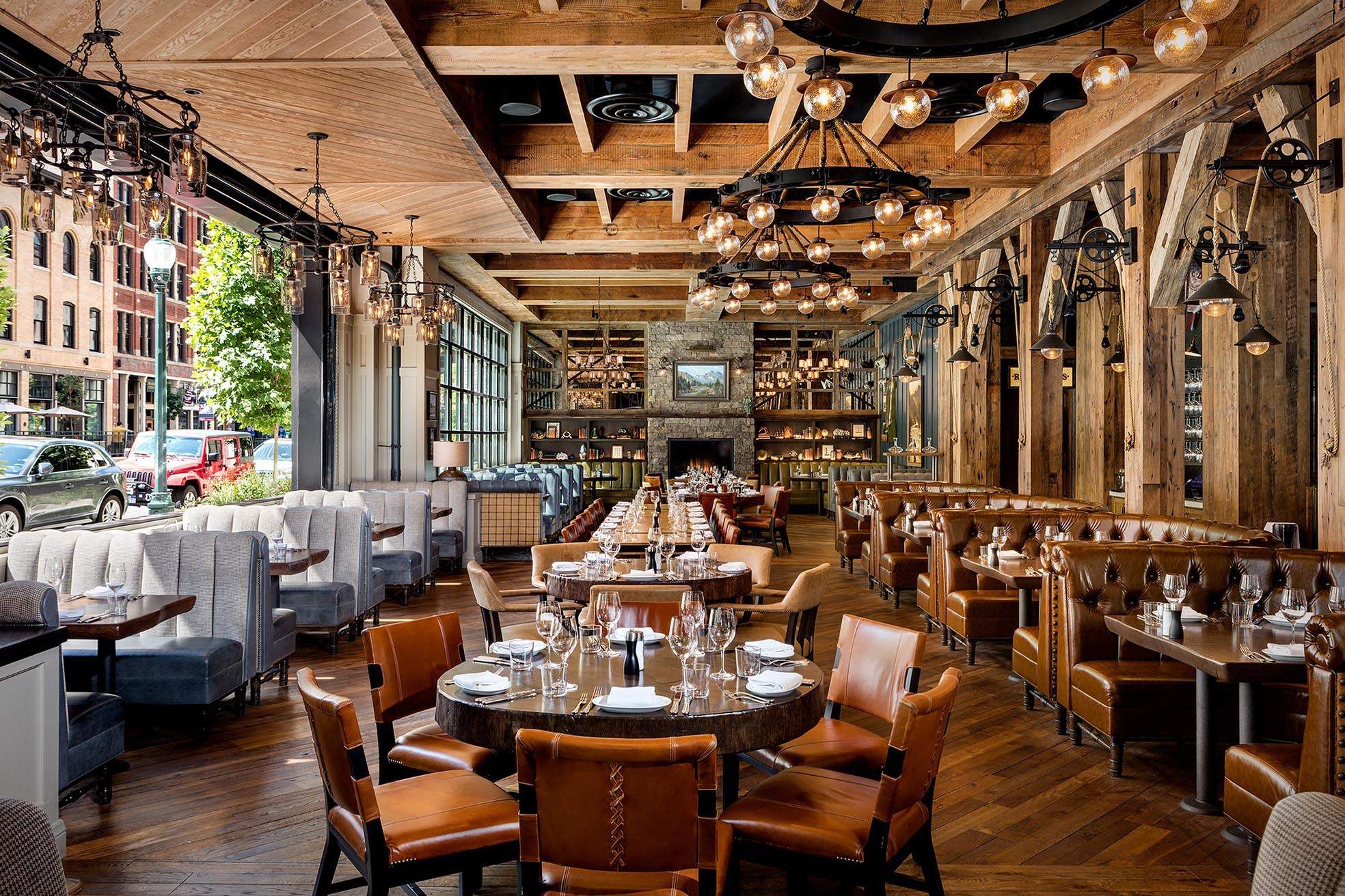 Leather seats and brass accents in the dining room at Water Grill in Denver