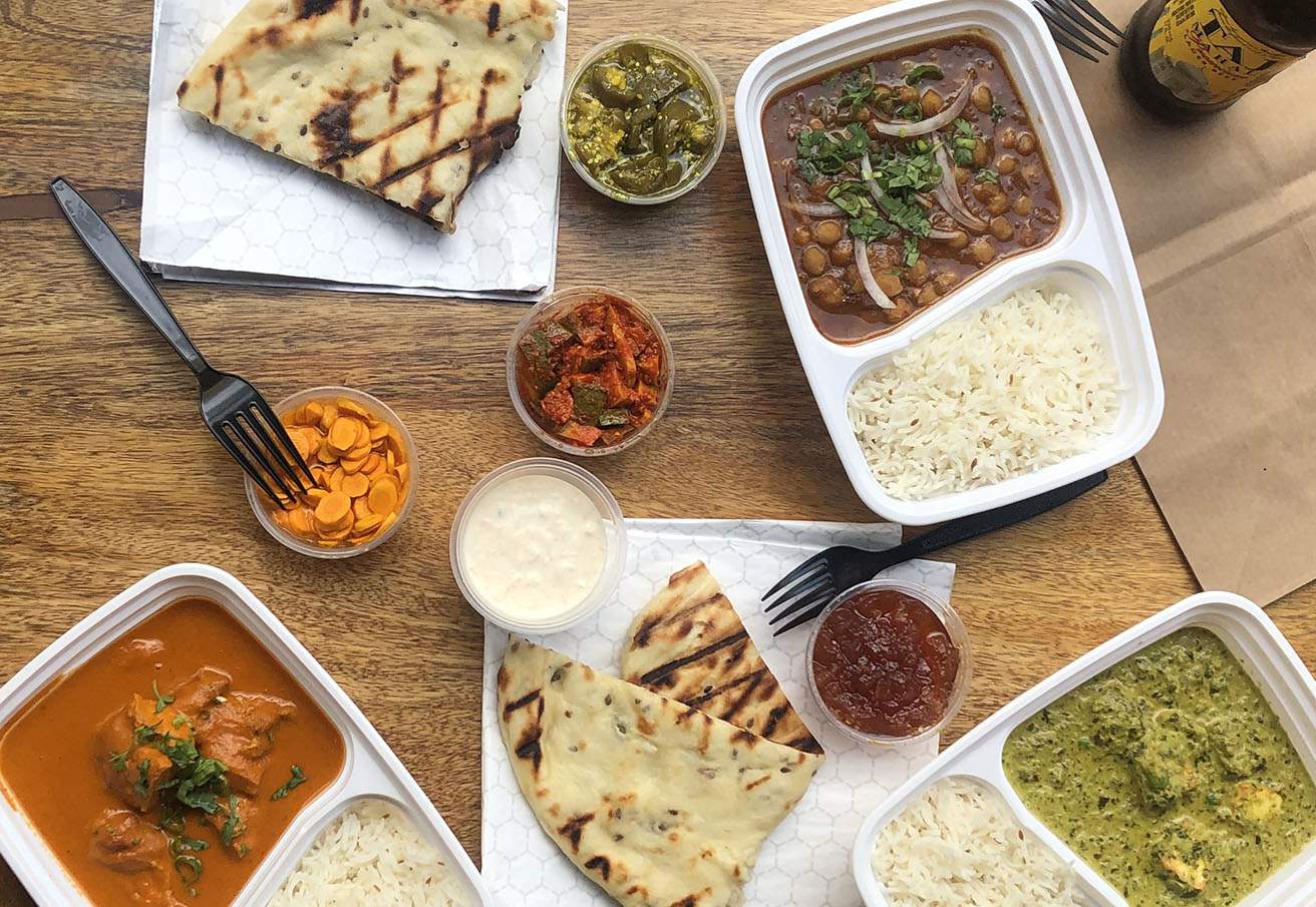 A spread of Indian dishes from Ghee in Miami