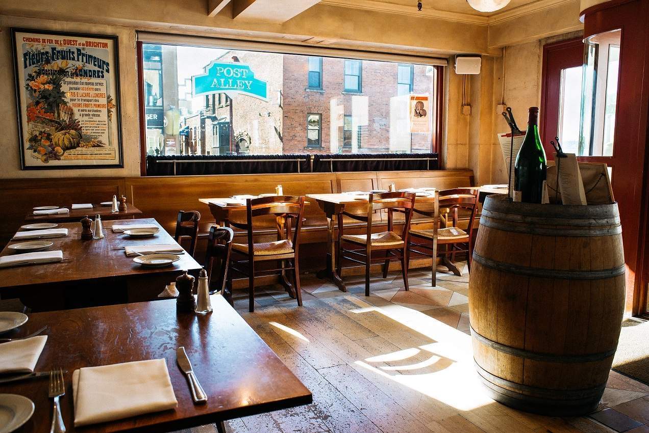 Paris-inspired wooden interiors at Cafe Campagne in Pike Place Market