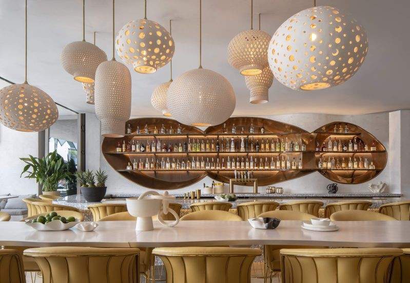 Ceramic lamps hang from the ceiling at Esperanza in Manhattan Beach