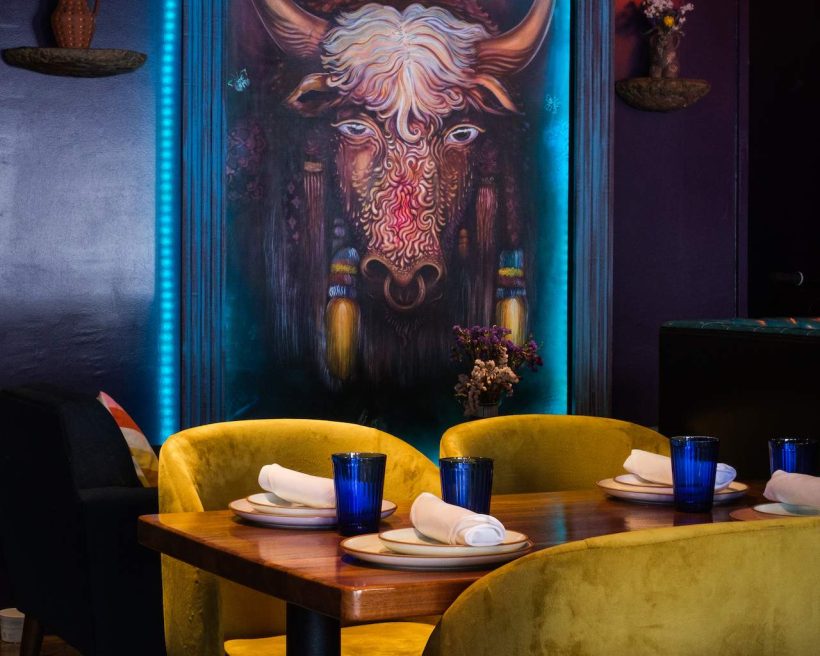 A colorful yak mural decks the walls at Dancing Yak, a Nepalese restaurant in the Mission.