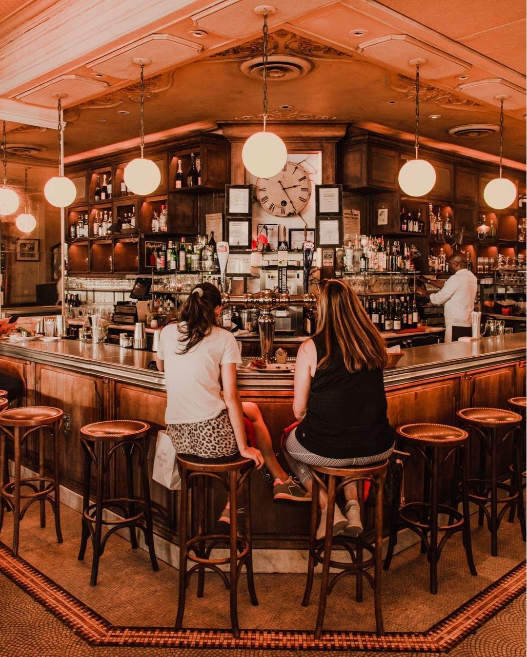 Diners perch at the bar at French-inspired Parc in Rittenhouse Square