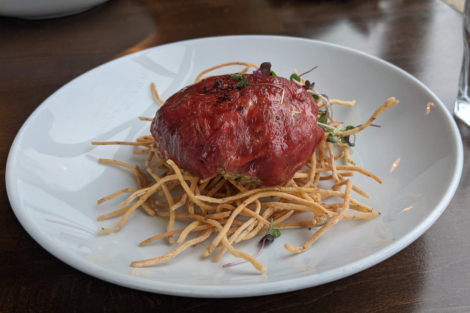 A close up of a dish called elk tartare.