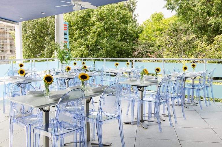 Sunflowers top the patio tables at Positano Coast by Aldo Lamberti in Philadelphia