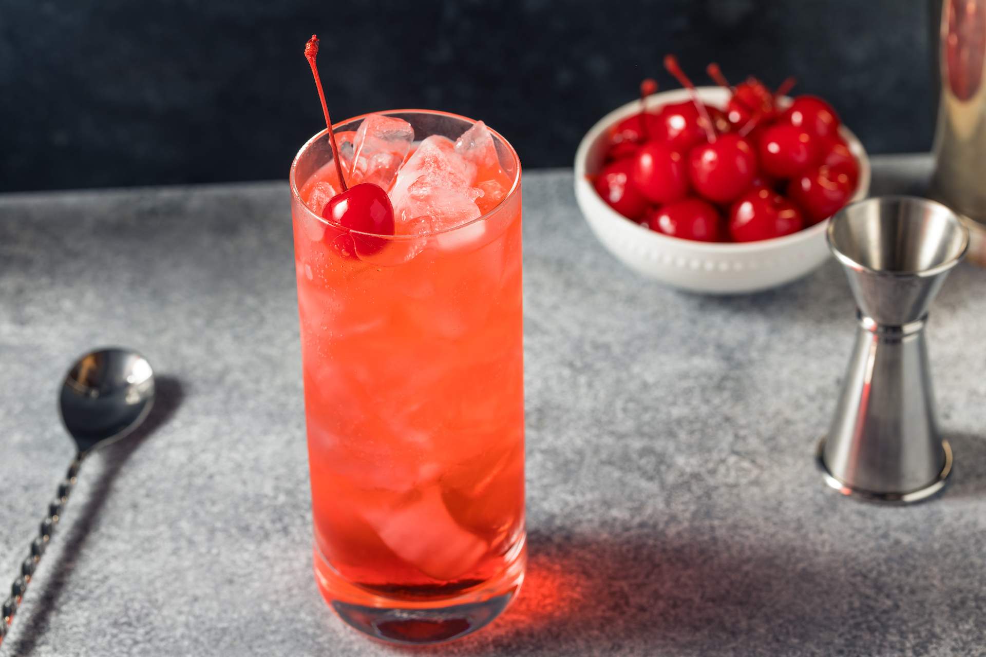 A pink drink with a cherry that's called a dirty shirley