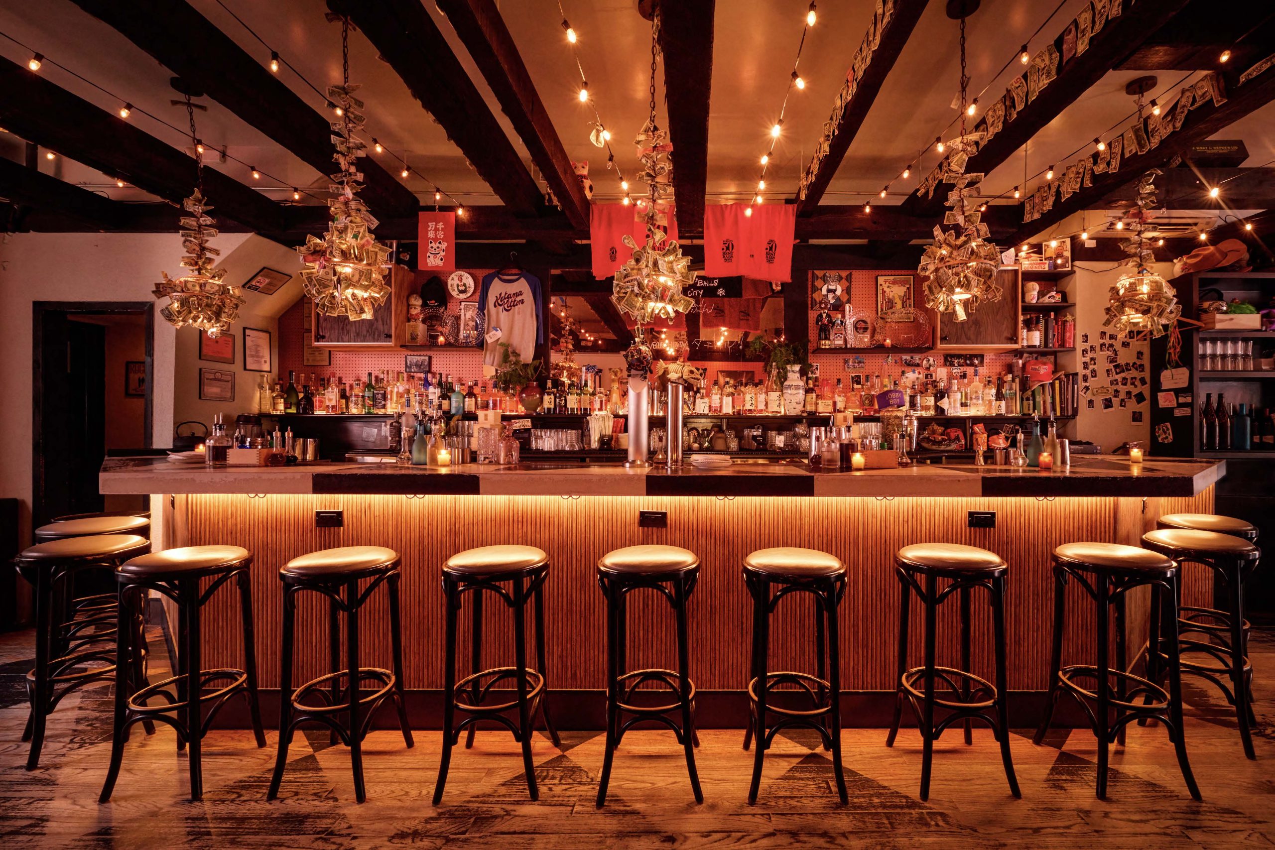 The brightly lit bar at Katana Kitten in New York City is stocked with liquors and tinctures.