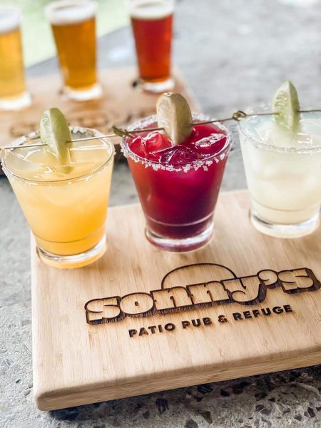 A trio of margaritas on a wooden tray at Sonny’s Patio Pub and Refuge in Nashville