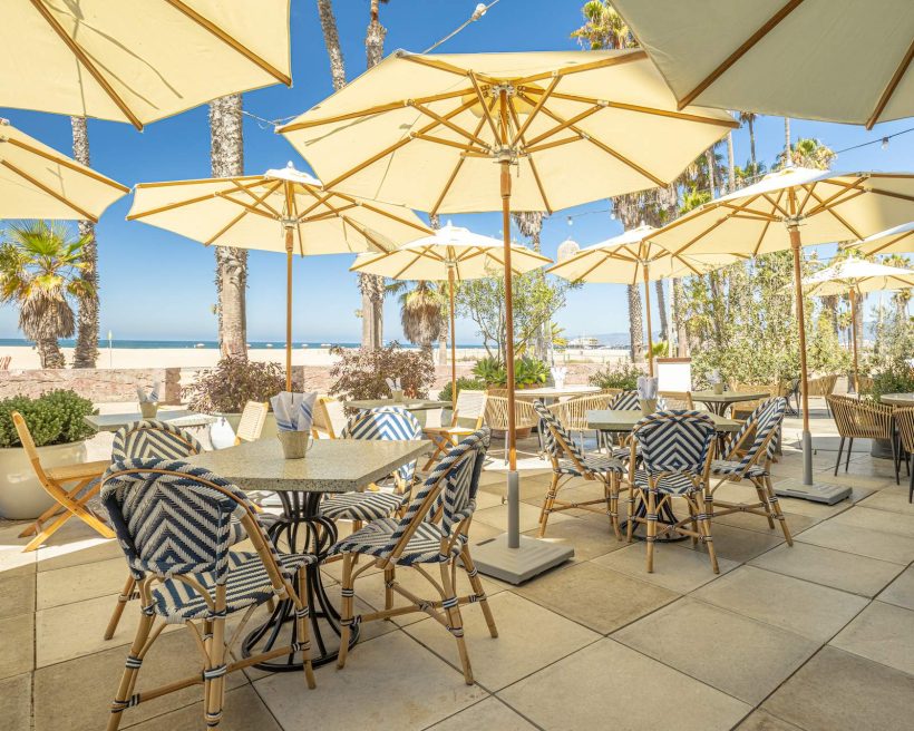 The patio at casa del mar with beach umbrellas