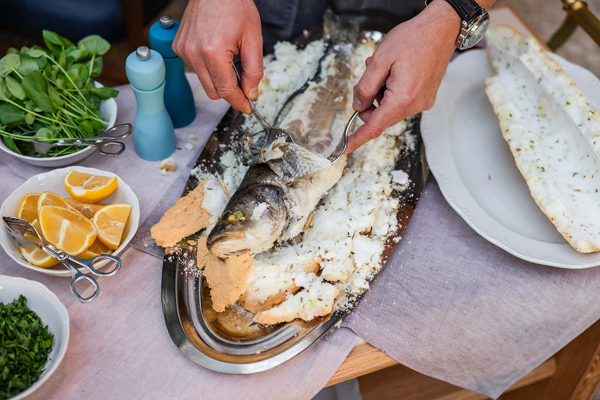 A plate with a sea bass on top