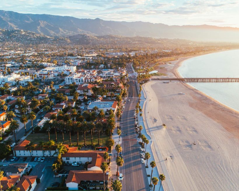 An aerial image of Santa Barbara with shops and houses and the beach