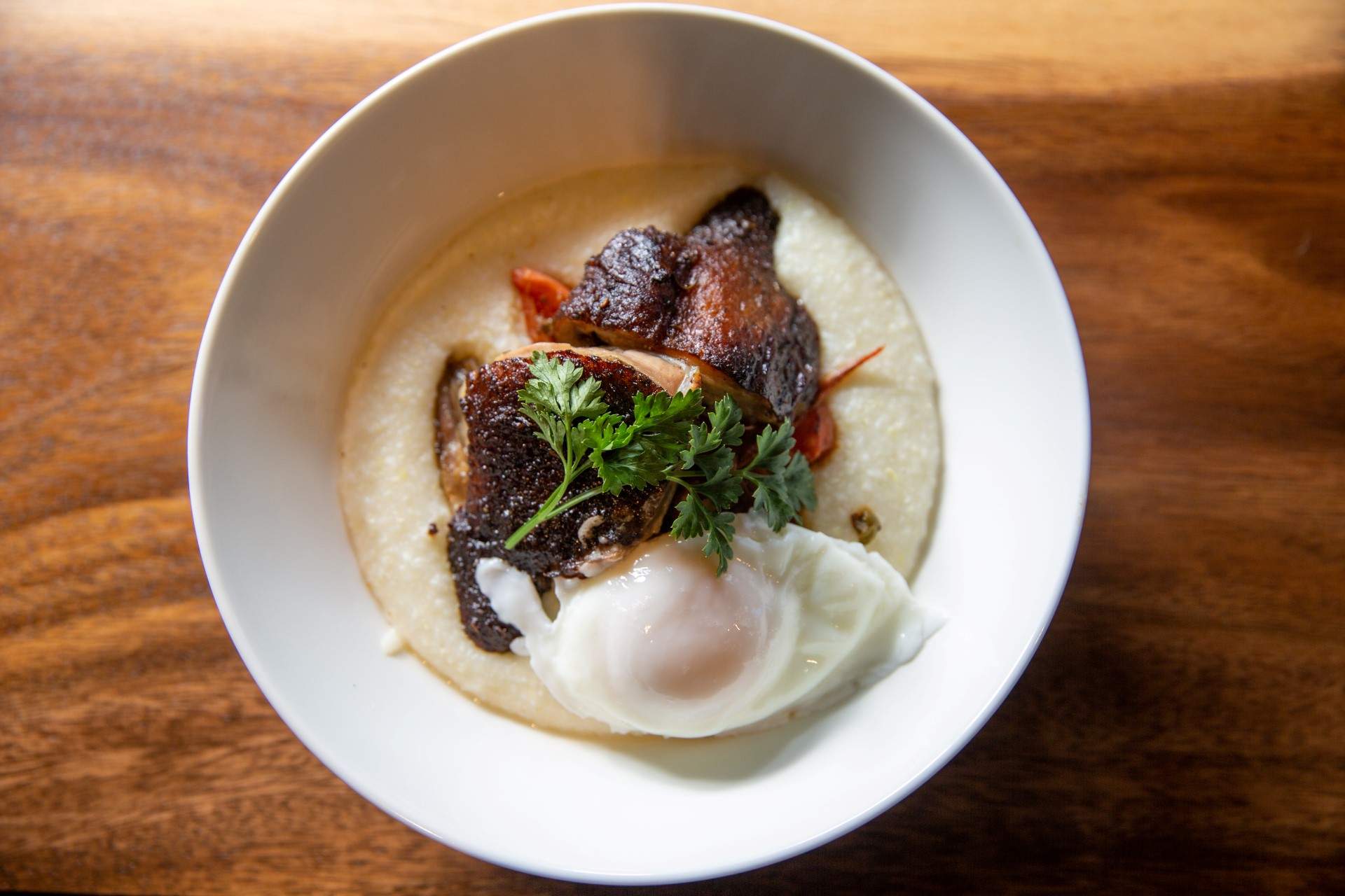 Roasted duck with grits at Calabash
