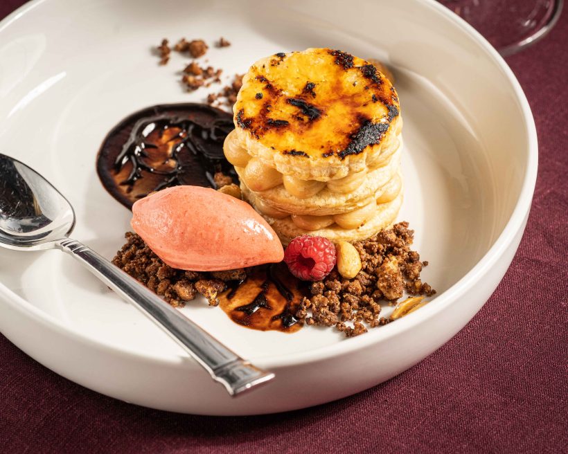 A Tagalong mille-feuille caramelized phyllo crisp, peanut butter cream, salted candied peanuts, dark chocolate streusel, and strawberry sorbet at Bistro Vendôme in Denver