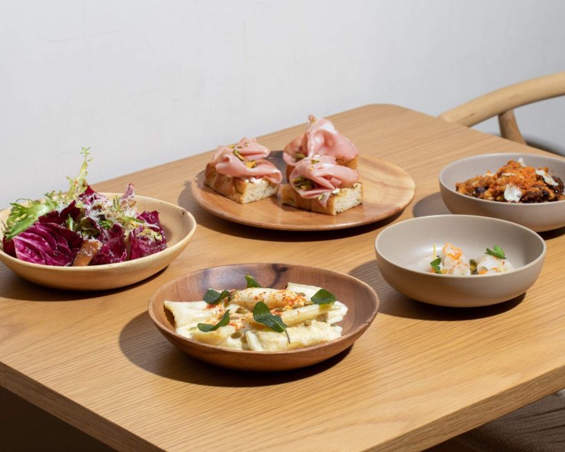 Mediterranean-inspired dishes at KOBO by Nai in the East Village include mortadella, ravioli, cavatelli, and radicchio salad