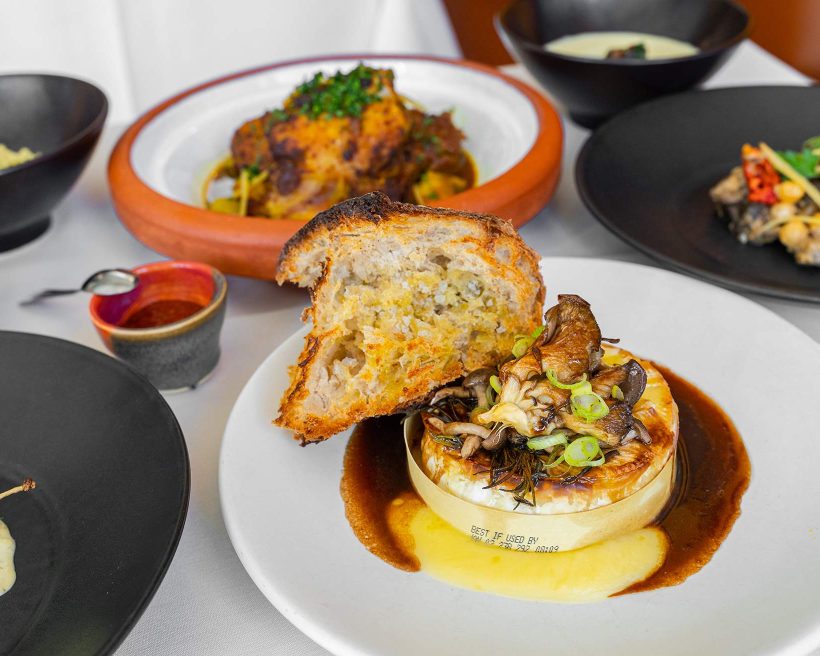 A baked Camembert wheel with oven-roasted wild mushrooms at LeTour in Evanston
