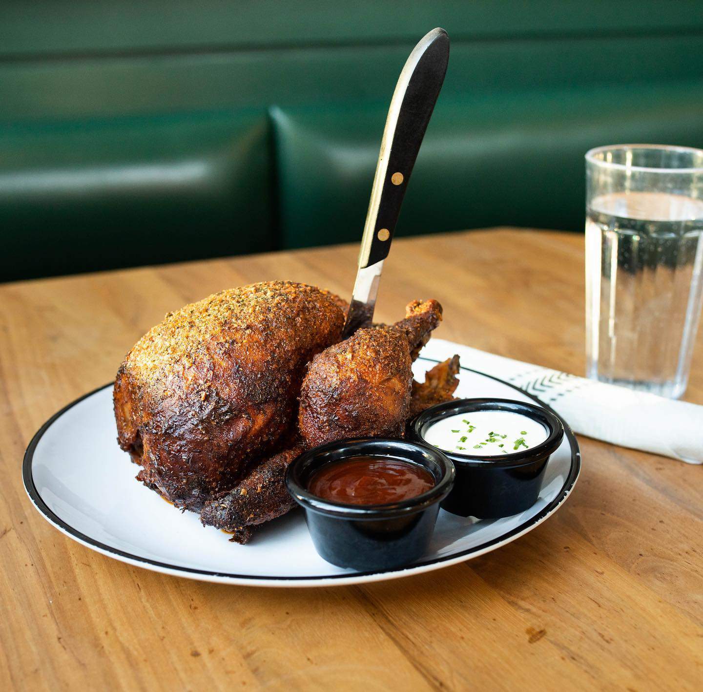 A whole rotisserie chicken at Shy Bird in South Boston