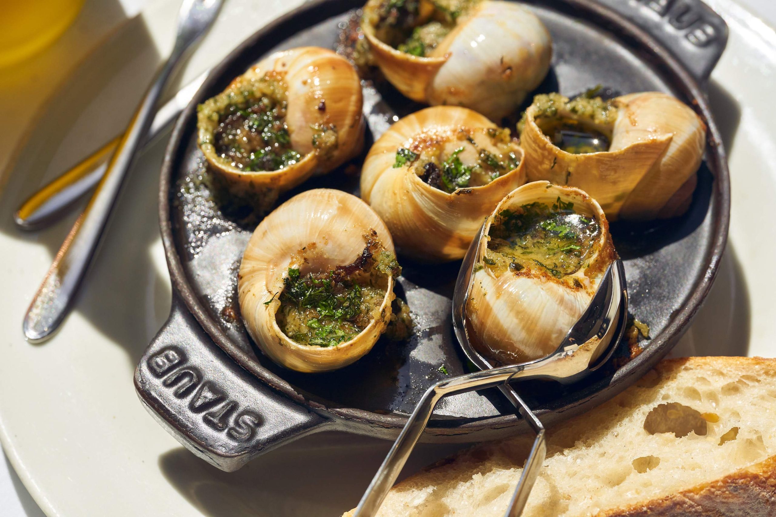 Snails with garlic butter and parsley at LPM in Miami