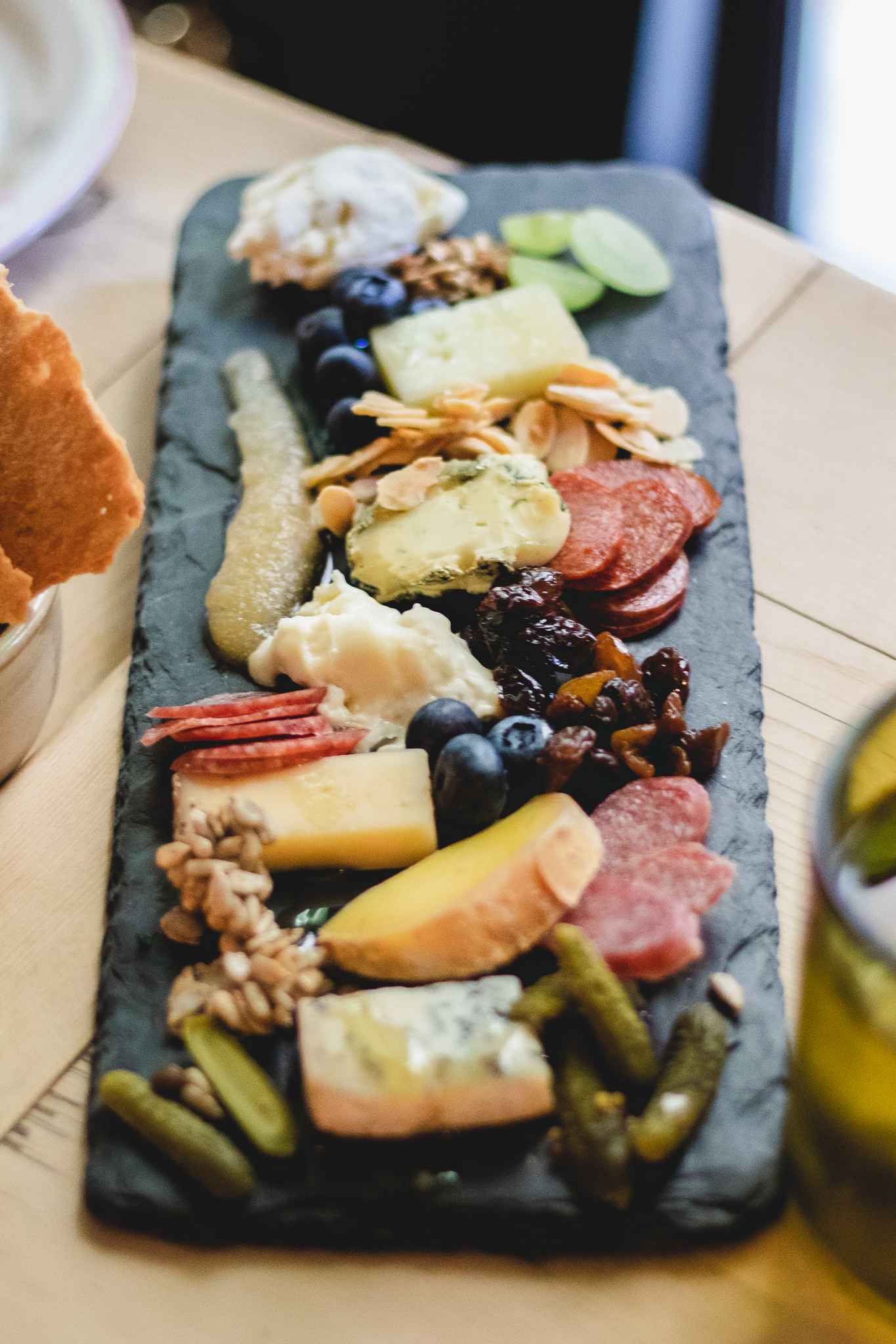 A cheese board with six artisan cheeses, candied nuts, honey, and housemade jam at Talula’s Garden in Philadelphia