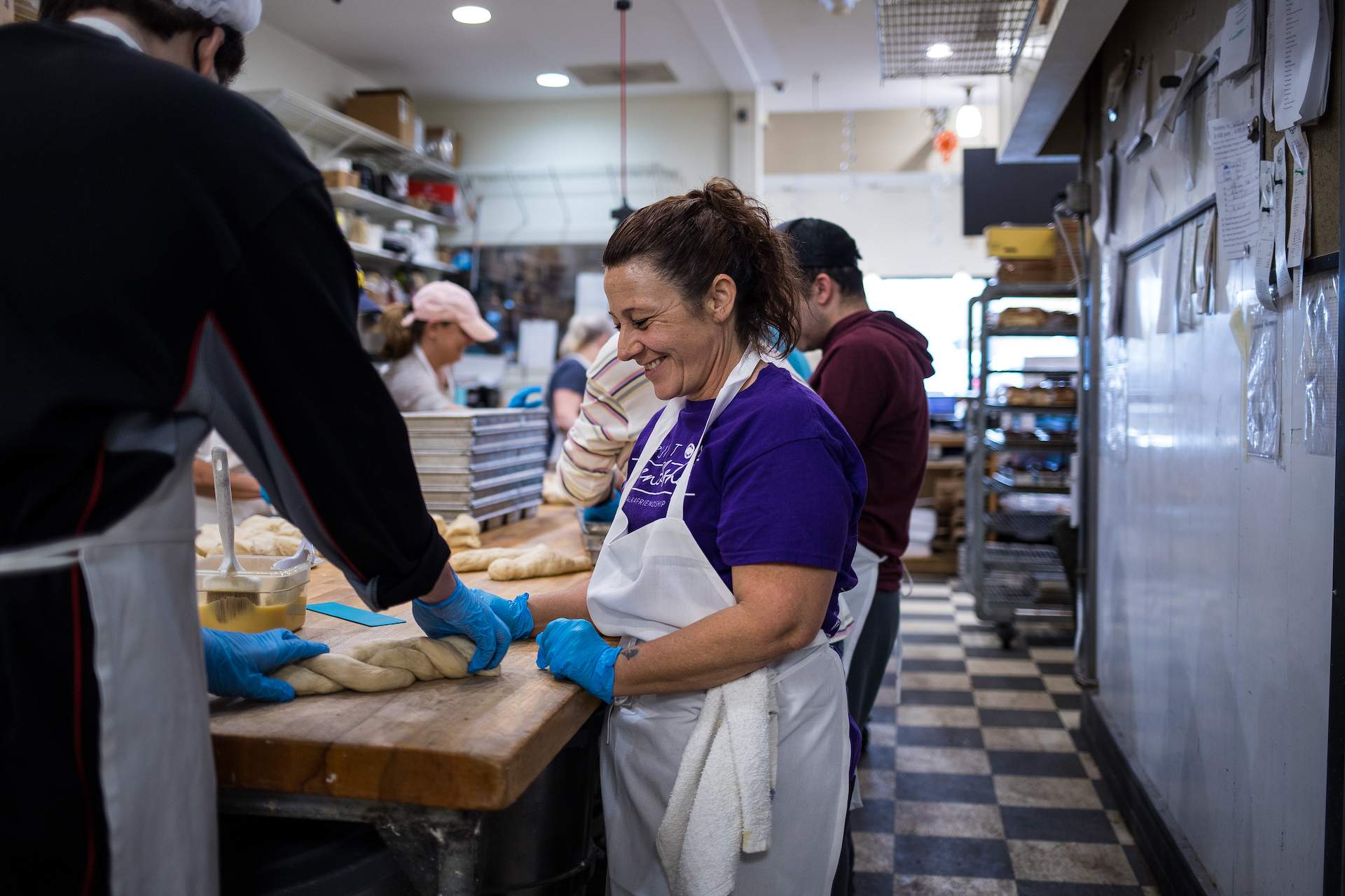 a woman preparing food at Soul Cafe in Michigan