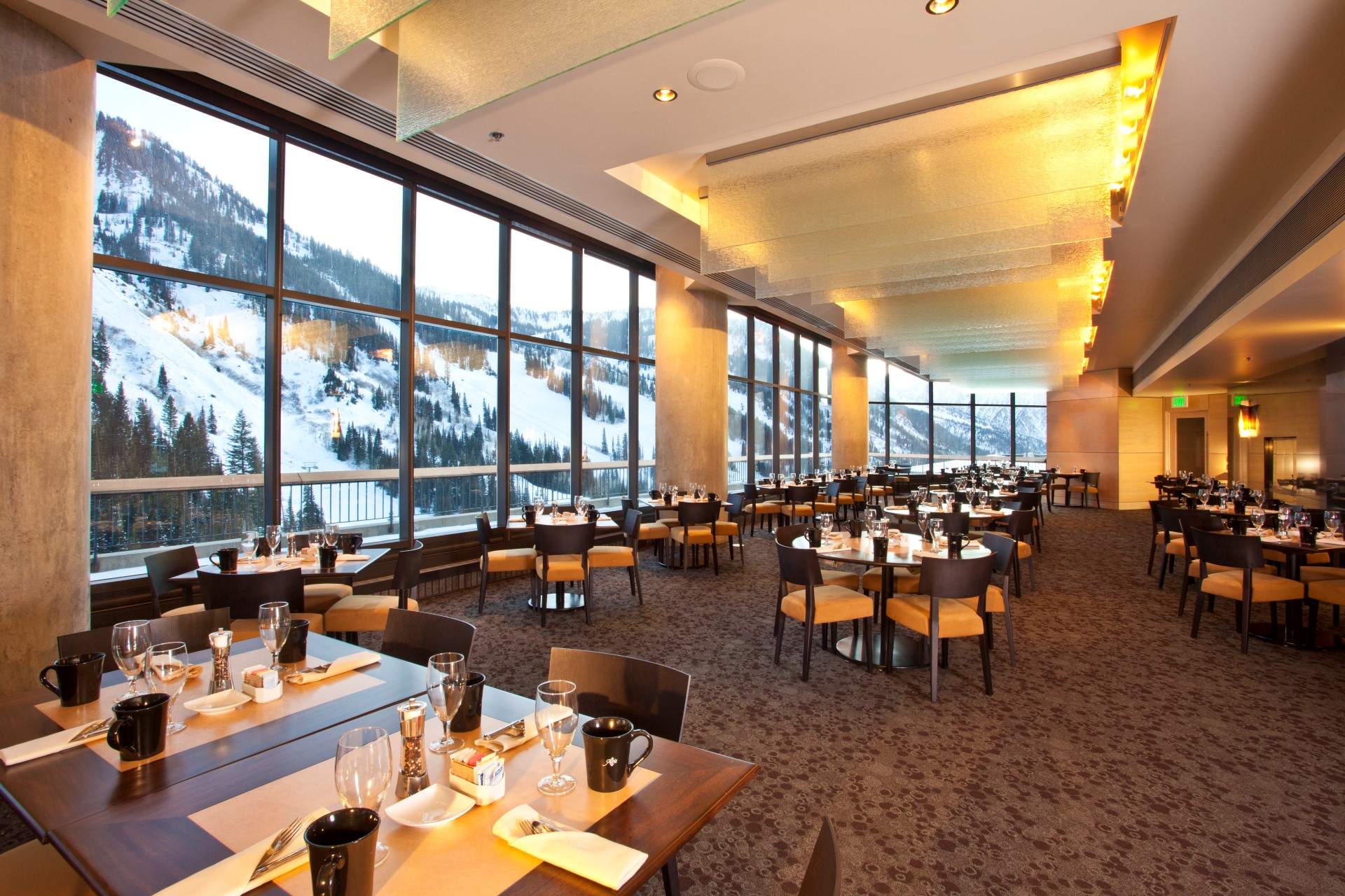 A bright dining room at The Aerie, set on the 10th floor of The Cliff Lodge in Snowbird, Utah