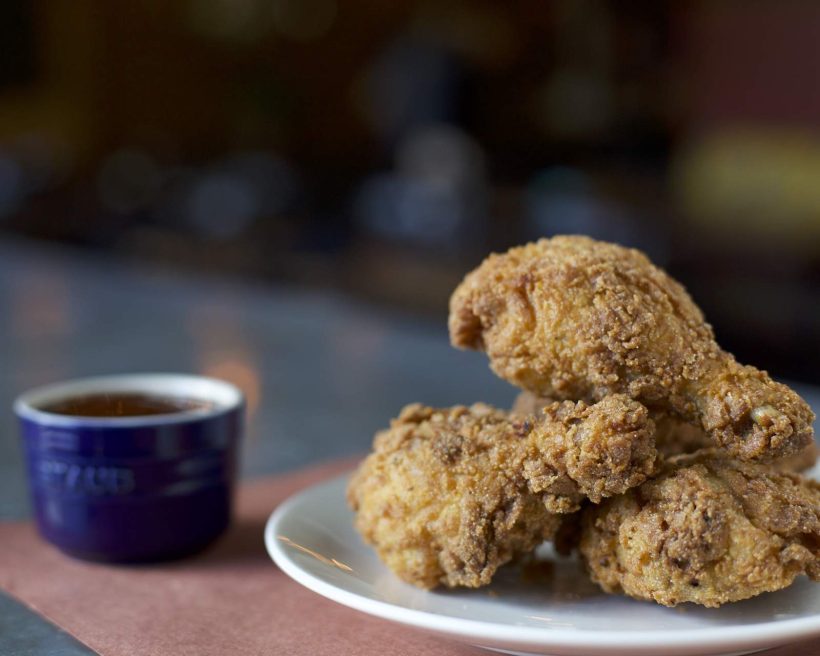 Fried chicken drumsticks at Chicago restaurant Split-Rail