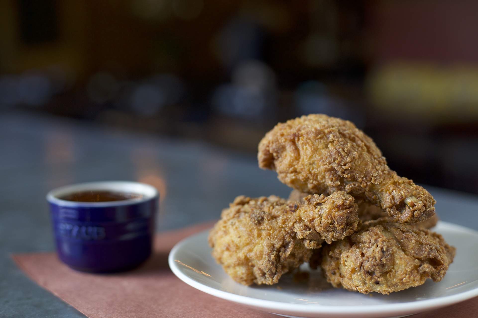 Fried chicken drumsticks at Chicago restaurant Split-Rail