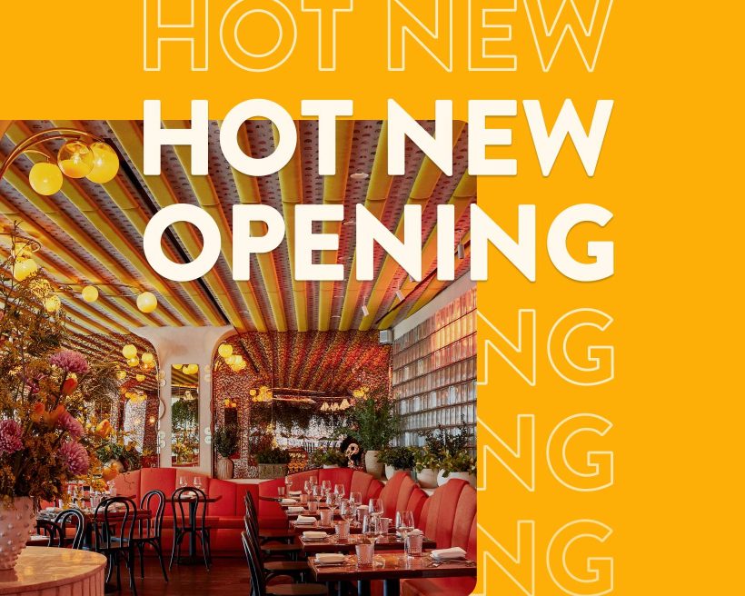 Inside Bad Roman in NYC, with orange-hued banquettes and wavy details