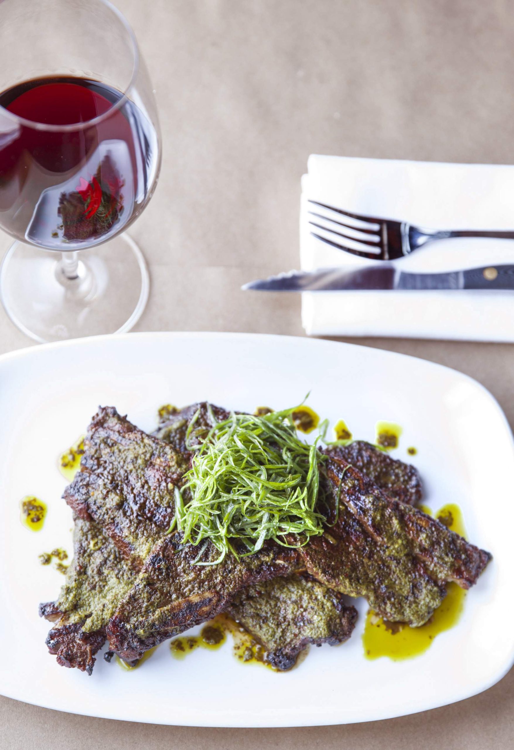 A tomahawk pork chop with fennel pollen at Chi Spacca in Los Angeles