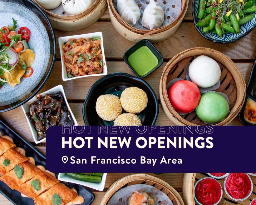 Several colorful dumplings placed on a wooden table at SF restaurant Dumpling Time