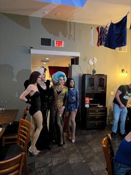Several drag queens standing side by side at San Francisco restaurant Vico Cavone.
