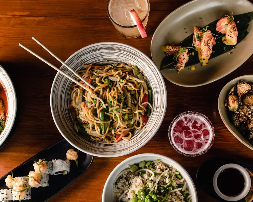 A group of dishes including noodles at the Boston restaurant Fat Baby Sushi and Cocktails