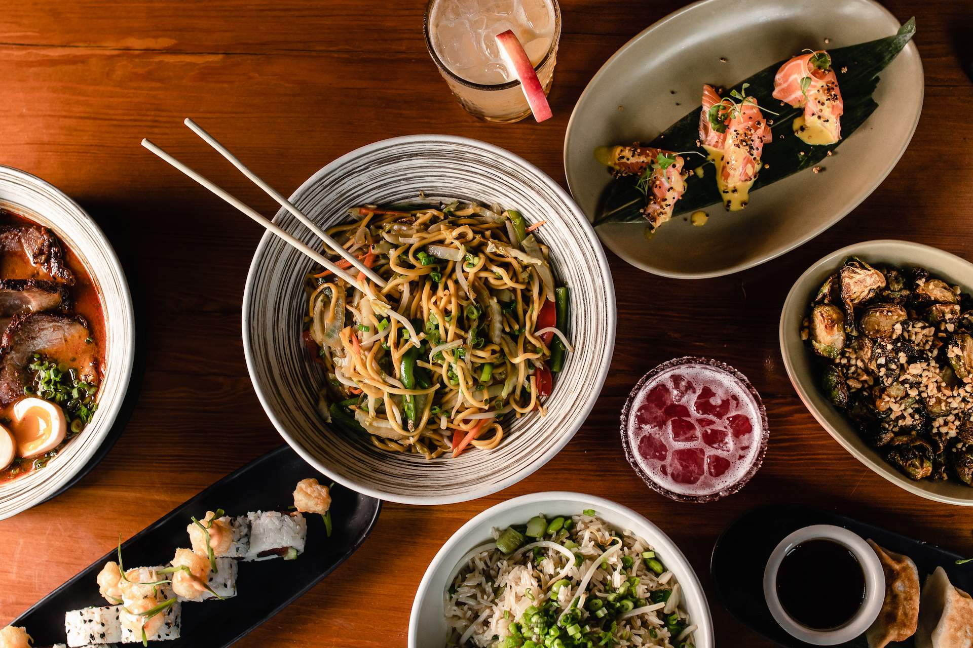 A group of dishes including noodles at the Boston restaurant Fat Baby Sushi and Cocktails