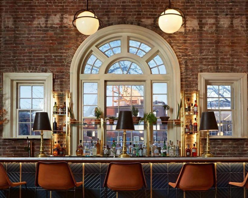Cathedral ceilings and a Carrara marble top bar at Longfellow in Boston