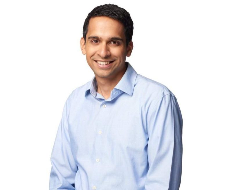 OpenTable CTO Sagar Mehta smiling in a blue collared shirt