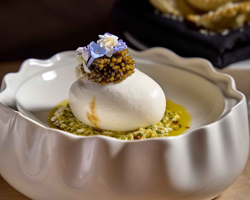 Burrata with avocado, aged balsamic, and caviar at Ummo in Chicago