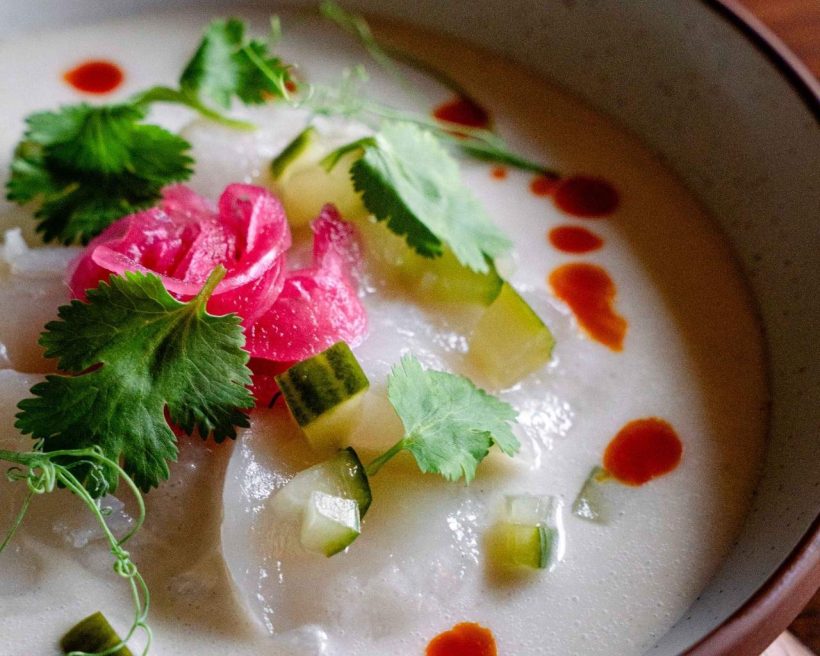 Leche de tigre ceviche at Carmel in Atlanta made with fish, shrimp, red onion, cilantro, lime, and sweet potato