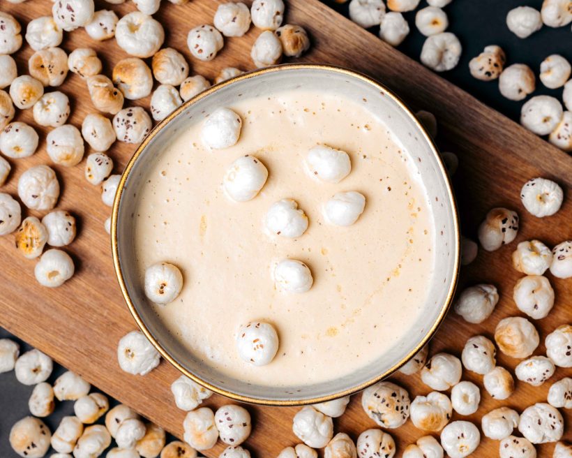 Popcorn soup with spiced lotus seeds at UMI by Vikram Garg in Honolulu