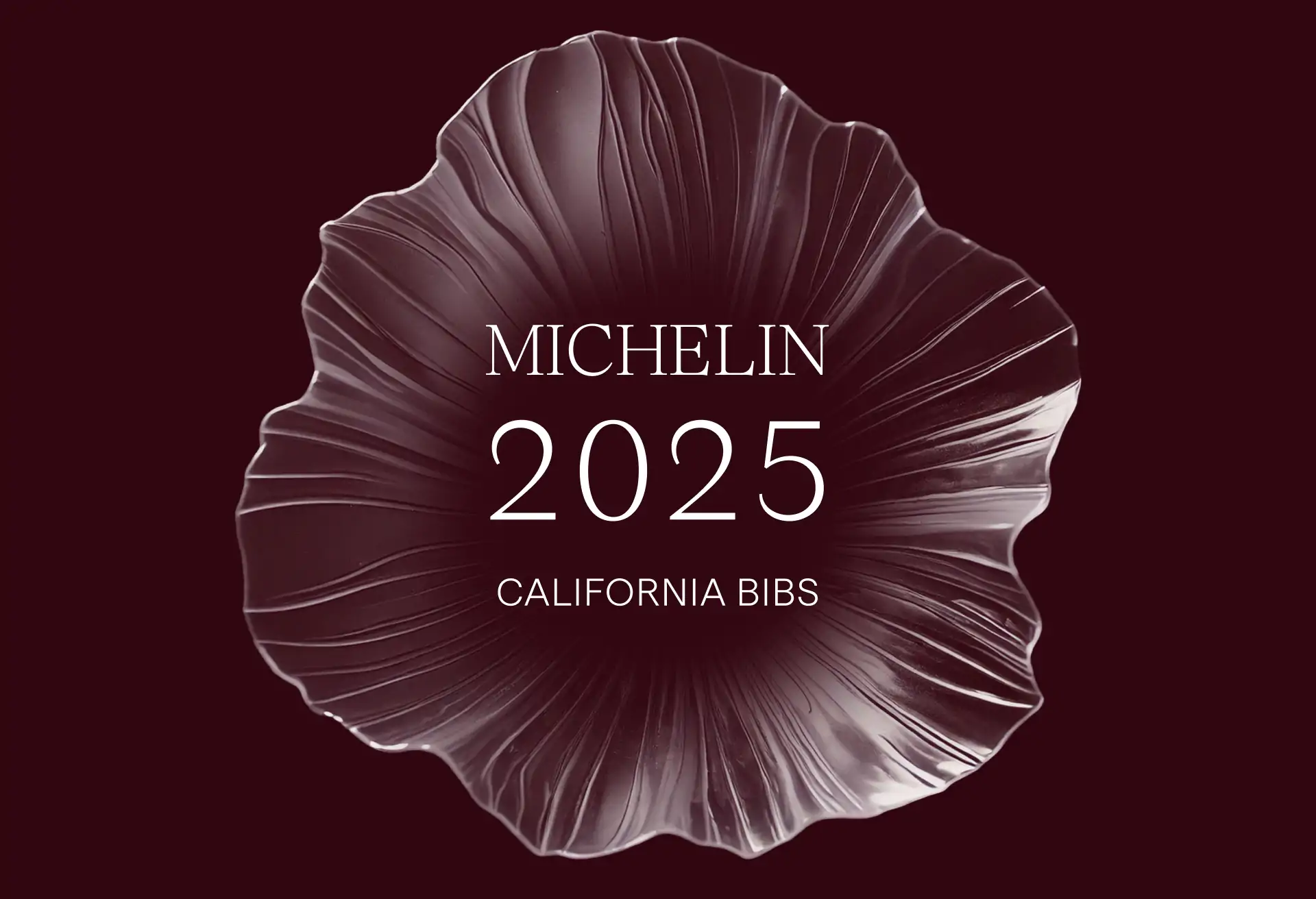 A flower on a maroon background with the words