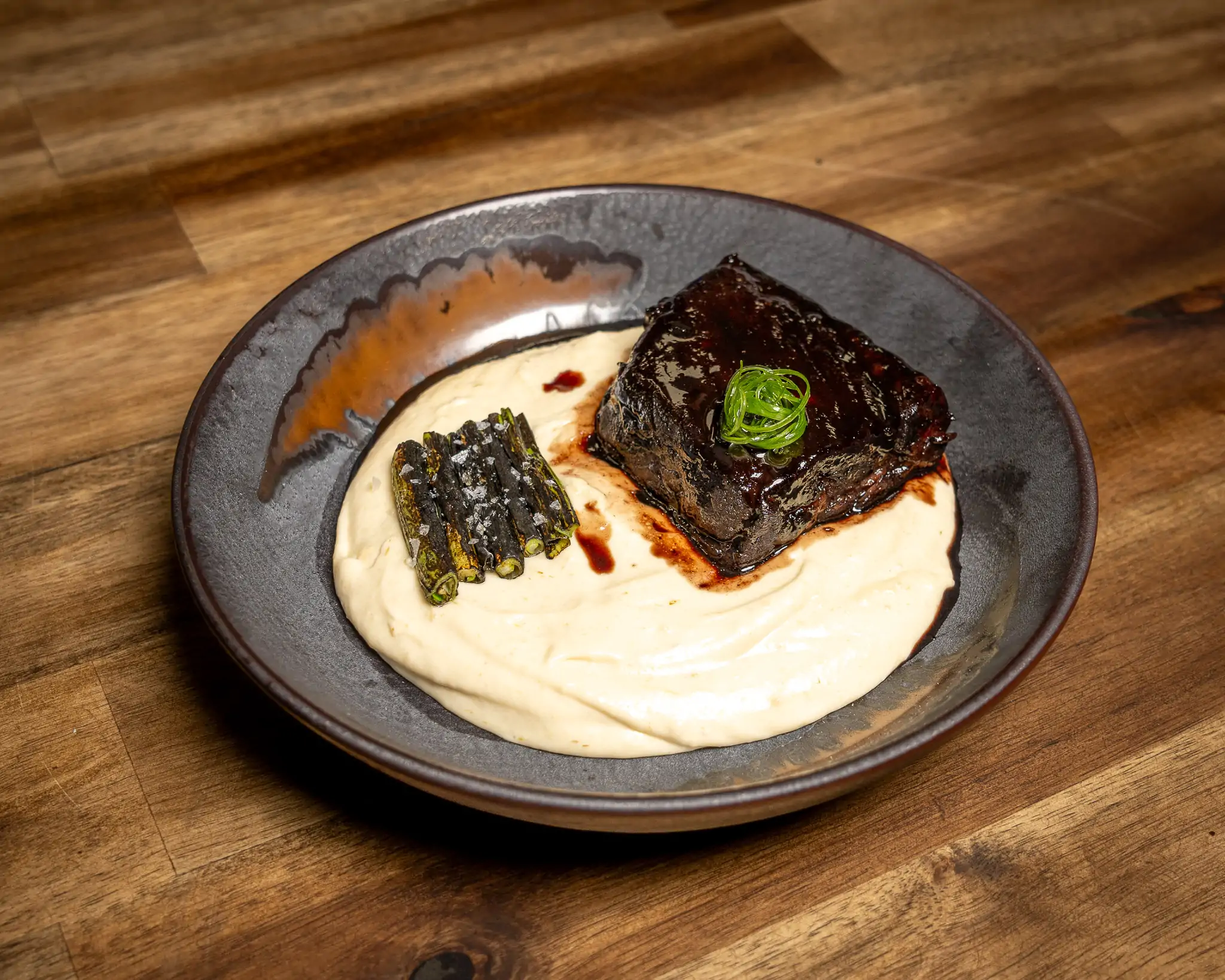 Glazed short rib on a bed of pureed potatoes at Chicago restaurant Kayao